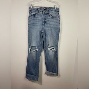 Edgily distressed high rise straight jeans.  10 reg